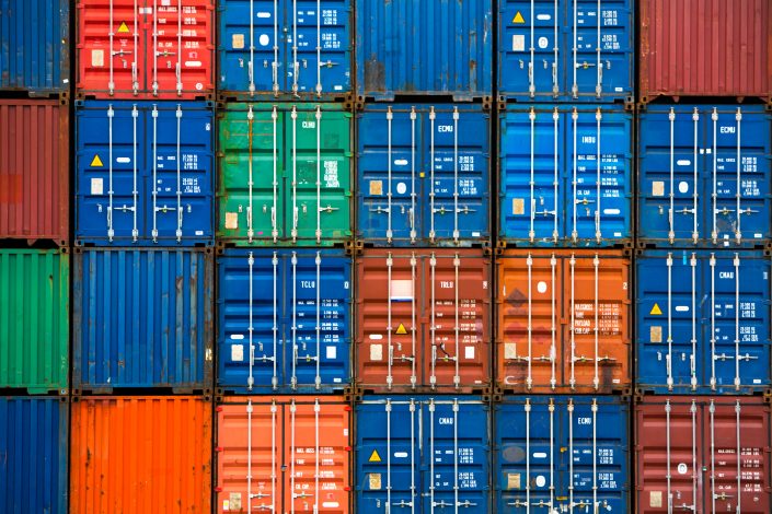 Four vertical rows of shipping containers Four vertical rows of shipping containers