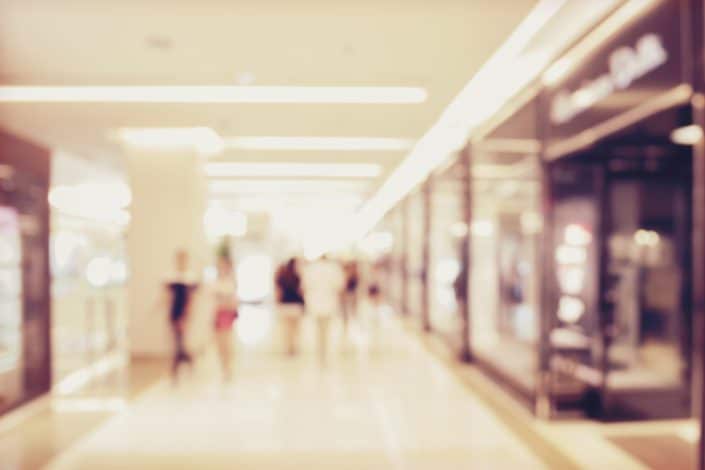 blur image of people shopping in department store blur image of people shopping in department store