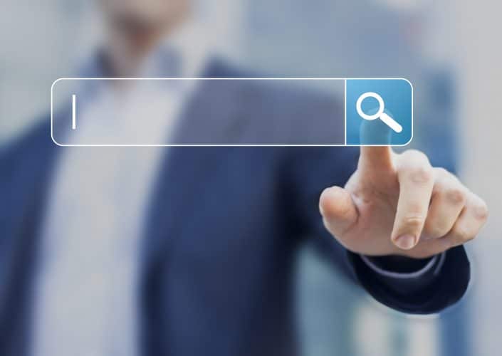 Search button on virtual screen pressed with finger Search button on virtual screen pressed with finger
