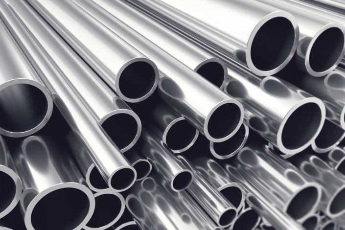 Heap-of-shiny-metal-steel-pipes-with-selective-focus-effect-538025236_2125x1416
