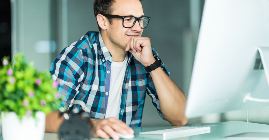 Image of someone researching Conversion Rate Optimization CRO at their MAC computer