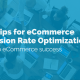 Image of a group of people sat at at a meeting shaking hands with laptops in front of them discussing converstion rate optimization CRO. the image has text overlay which reads '7 top tips for ecommerce conversation rate optimization'