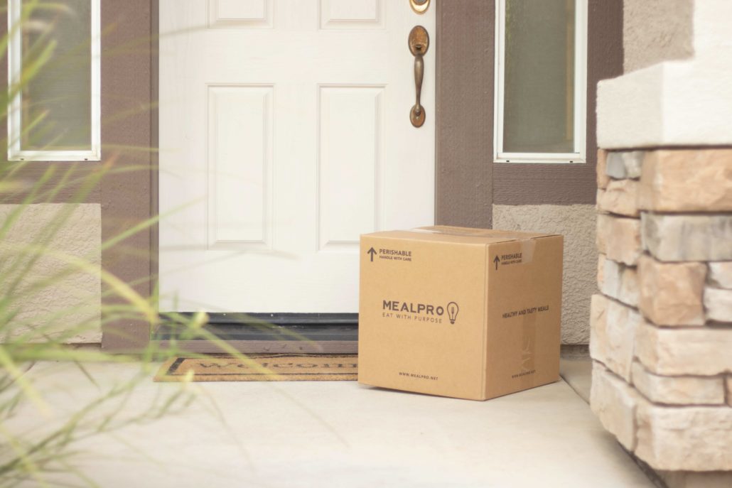 image of a parcel at someone's door step