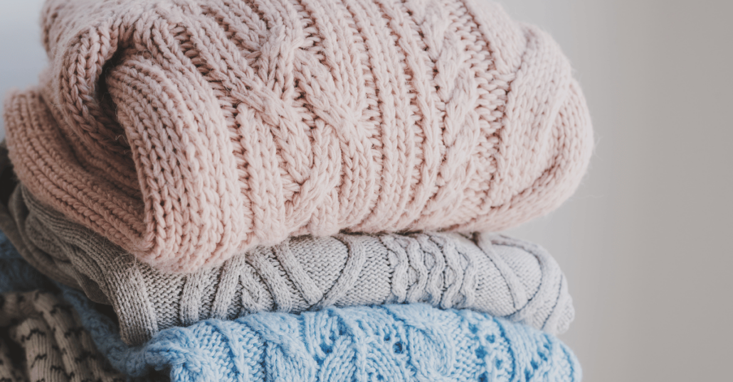 image of 3 x different colored wool sweaters