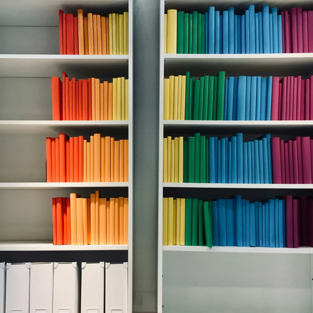image of colorful books on a shelf